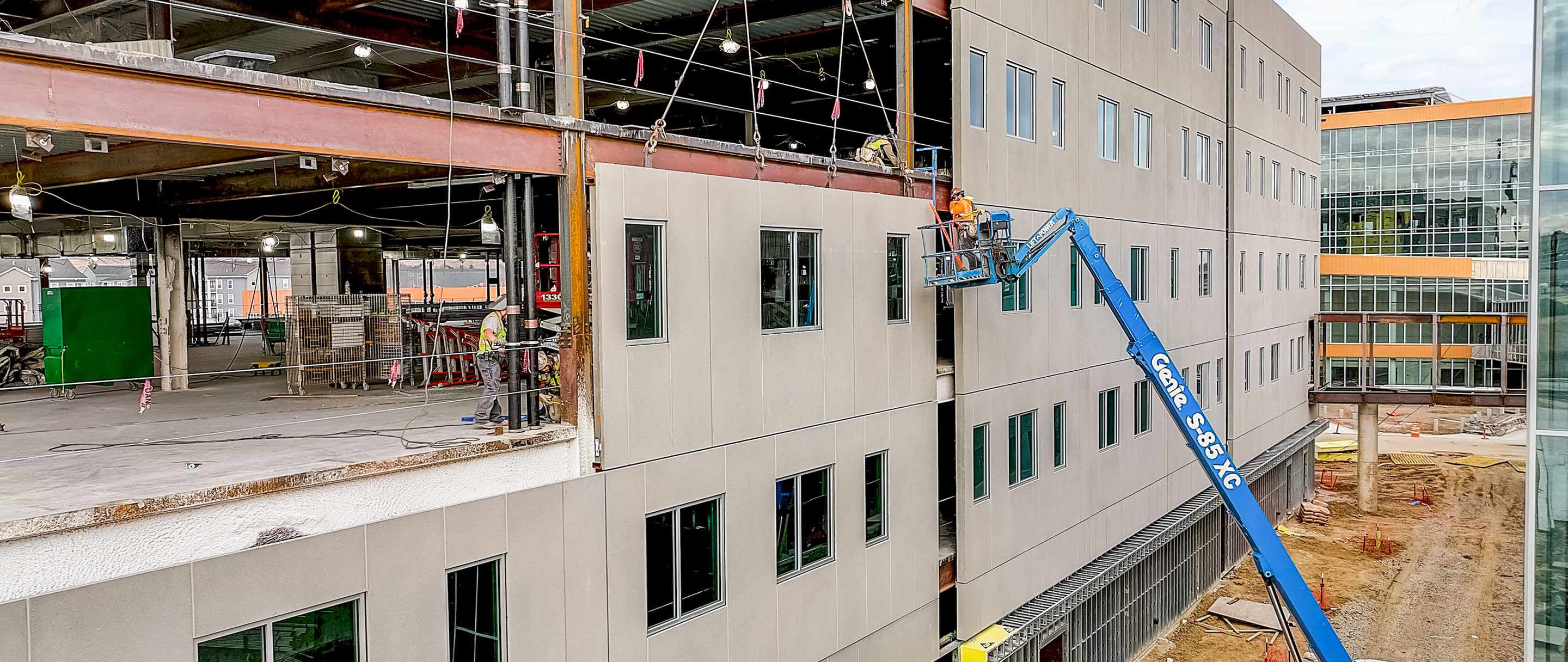 installation of an infinite facade panel with field crew