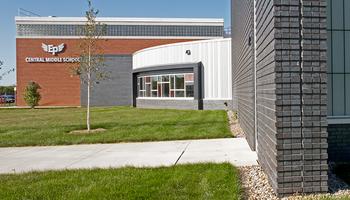 exterior of eden prairie middle school with a total precast storm shelter