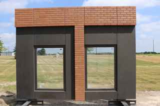 infinite facade panel with dark gray finish and thin brick finish