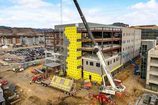 wheat ridge MOB during construction with crane lifting infinite facade panel